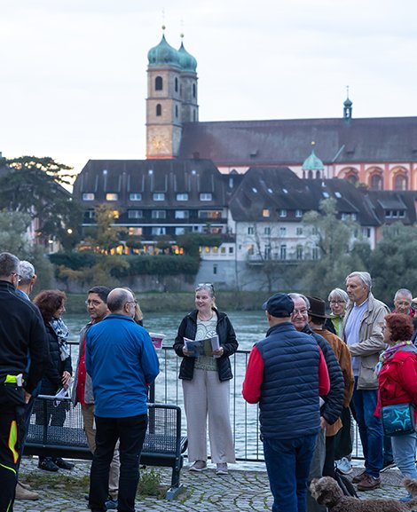 Walkers looking out toward the church of Bad Säckingen.