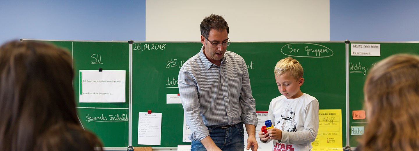 Teacher and student in the classroom