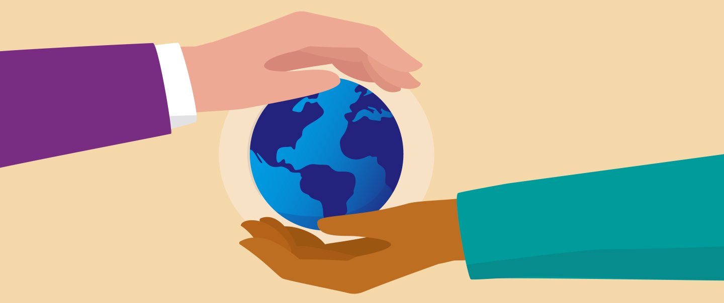 Two hands holding a globe