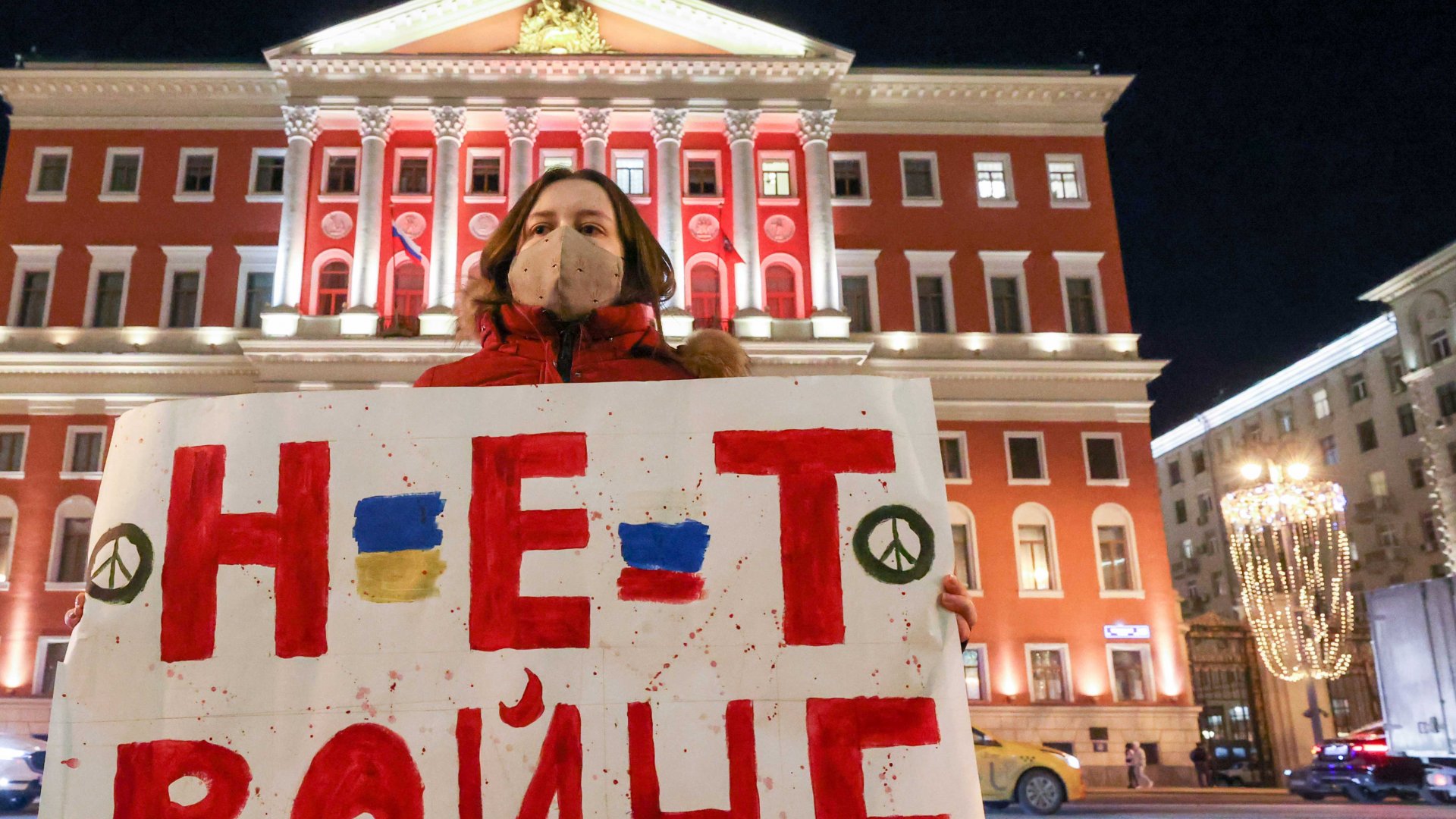 "No war" is written on the poster of a protester in Russia.