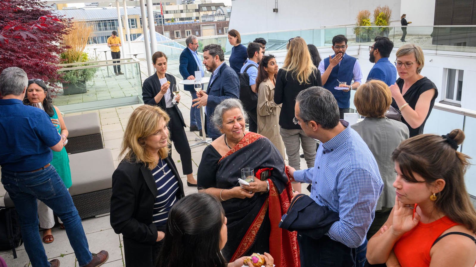 RBA Fellows talking on the roof terrace of the Robert Bosch Stiftung Berlin